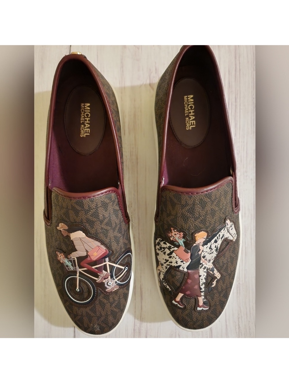 Michael Kors Brown Logo Slip-On Sneakers with Maroon Trim and Illustrated Motifs